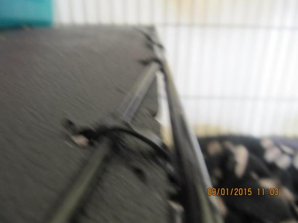 another view of the plastic insert zip tied to the metal cross piece to close the gaps